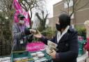 David L Williams, food bank volunteer and customer, serves venison at Ringcross Food Bank in Holloway