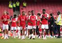 Arsenal players enjoy a lap of honour after their last game of the season