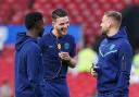 Declan Rice shares a joke with Bukayo Saka and Luke Shaw while on England duty