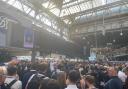 People to board train at London's Waterloo station