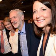 Jeremy Corbyn (centre) accepts congratulations after he was announced as the Labour Party's new leader. Stefan Rousseau/PA Wire