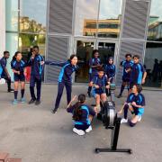 Youngsters enjoy competing on a rowing machine