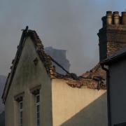 A house damaged in last year's Wennington fire