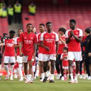 Arsenal players enjoy a lap of honour after their last game of the season