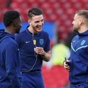 Declan Rice shares a joke with Bukayo Saka and Luke Shaw while on England duty