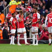 Arsenal's Martin Odegaard looks dejected after the North London derby