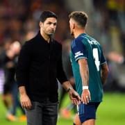 Mikel Arteta looks dejected after Champions League defeat in France