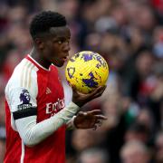 Eddie Nketiah celebrates with the match ball