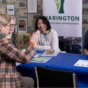 Members of 'sustainability' group recruiting a volunteer