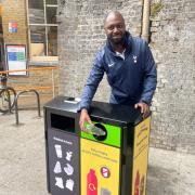 Ledley King testing one of the new recycle bins in Tottenham High Road