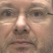 Solicitor Stuart Cottis has been jailed for child sex offences