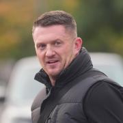 Political activist Tommy Robinson outside Folkestone Police Station, he has said he has been told to hand himself in to a police station where he expects to be arrested ahead of a planned march for thousands of people in London. Supporters of Robinson,