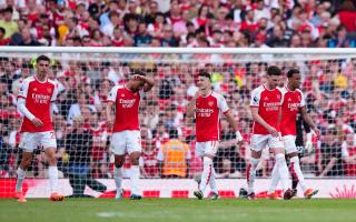 Arsenal players look dejected