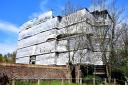 Heath House has been covered by protective - if unsightly - scaffolding and a temporary roof for several years