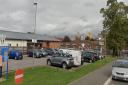 The side view of the Wembley Centre for Health and Care car park and a  side view of the old Wembley Hospital building to be sold