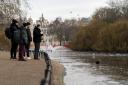 Coots walk on a thin layer of ice in St James's Park Lake in St James's Park, London. Snow and ice is set to be replaced by wind and rain as milder air returns to the UK. Picture date: Saturday January 20, 2024