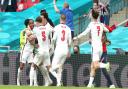 England's Raheem Sterling (left) celebrates scoring their side's first goal of the game during the UEFA Euro 2020 round of 16 match at Wembley Stadium, London. Picture date: Tuesday June 29, 2021.