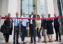 Mayor of Hackney Philip Glanville cuts a ribbon to mark the opening of the new Britannia Leisure Centre at Shoreditch Park.