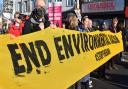 People marching along Fore Street in a protest against the Edmonton Incinerator on January 16