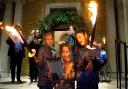 Carols on the steps outside St Mary's, Islington. Pictured are Rosalind Myers, Frankie Erskine and Harriet Middleton