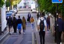 People walking to and from the Angel in St Peter's ward