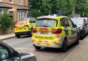 Police and ambulance service cars in the Elthorne Estate on June 2