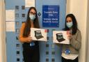 Trauma and stress clinic assistant psychologists Abbie and Noor with the tablets donated by Asda and Helpforce. Picture: C and I NHS Trust