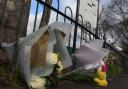 Flowers at the scene of the crash that killed Lewis Johnson in 2016. Picture: Ken Mears