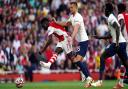 Arsenal's Bukayo Saka in last year's North London Derby at the Emirates