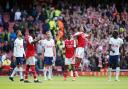 Arsenal celebrate their win over Tottenham earlier this season