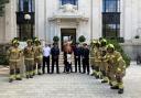 Firefighters outside Islington Town Hall with Julie and Kevin