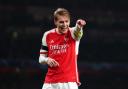 Martin Odegaard celebrates Arsenal's fifth goal against Lens