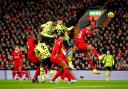 Gabriel heads Arsenal into an early lead against Liverpool