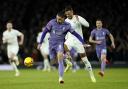 Arsenal's Ben White battles for the ball with Liverpool's Darwin Nunez