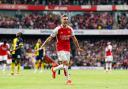 Arsenal's Leandro Trossard celebrates scoring their side's second goal of the game during the Premier League match at the Emirates Stadium, London. Picture date: Saturday May 4, 2024.