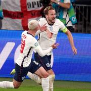 England's Harry Kane celebrates scoring their side's second goal of the game with Phil Foden during the UEFA Euro 2020 semi final match at Wembley Stadium, London. Picture date: Wednesday July 7, 2021.