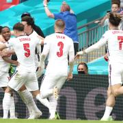 England's Raheem Sterling (left) celebrates scoring their side's first goal of the game during the UEFA Euro 2020 round of 16 match at Wembley Stadium, London. Picture date: Tuesday June 29, 2021.