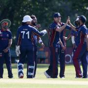 Wanstead's Joe Ellis-Grewal (centre) celebrate a wicket at Overton Drive