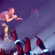 Chris Martin meets the Wembley crowd