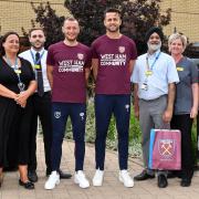 Vladimir Coufal and Lukasz Fabianski met staff at Queen's Hospital