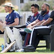 Wanstead's Joe Ellis-Grewal (left) and teammates look on at Castle Park