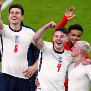 England’s Phil Foden and Declan Rice celebrate winning the UEFA Euro 2020 semi final match at Wembley Stadium, London. Picture date: Wednesday July 7, 2021.