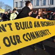 People marching along Fore Street in a protest against the Edmonton Incinerator