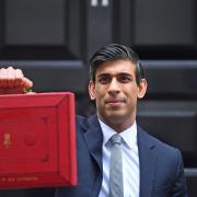 Chancellor of the Exchequer, Rishi Sunak, holds his ministerial 'Red Box' outside 11 Downing Street, London, before heading to the House of Commons to deliver his Budget.