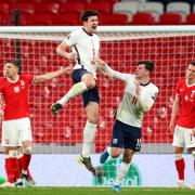 England's Harry Maguire celebrates scoring against Poland at Wembley Stadium