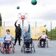 Her Royal Highness, Sophie Helen Rhys-Jones, Countess of Wessex, GBR Wheelchair Basketball International Joy Haizelden and young players in Finsbury Park.