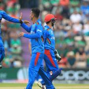 Afghanistan's Mujeeb Ur Rahman (centre) celebrates taking the wicket of Bangladesh's Soumya Sarkar during the ICC Cricket World Cup group stage match at The Hampshire Bowl, Southampton.