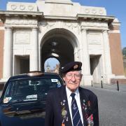 Ken Watts in 2016 at the Menin Gate Memorial to the Missing in Ypres, Belgium, dedicated to the British and Commonwealth soldiers who were killed in the Ypres Salient of World War I and whose graves are unknown