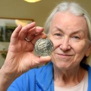 Jan Pollock with her Robert Lawrence medal, awarded by Diabetes UK for living with diabetes for over 60 years