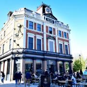 Customers and market stalls outside the Archway Tavern in Navigator Square at the weekend. Outdoor space at the pub opened back up on April 12